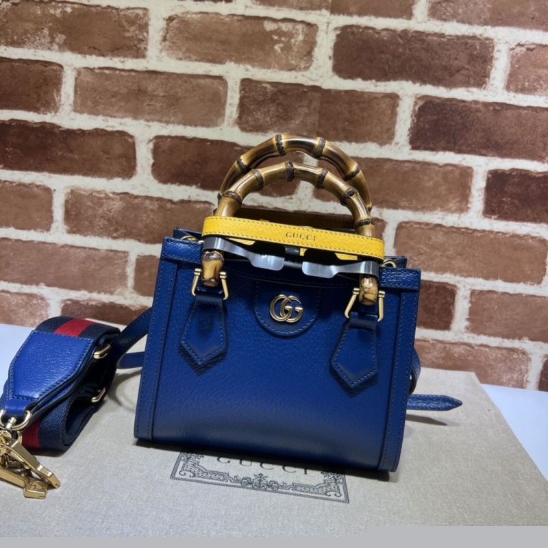G*u*i top handle bags